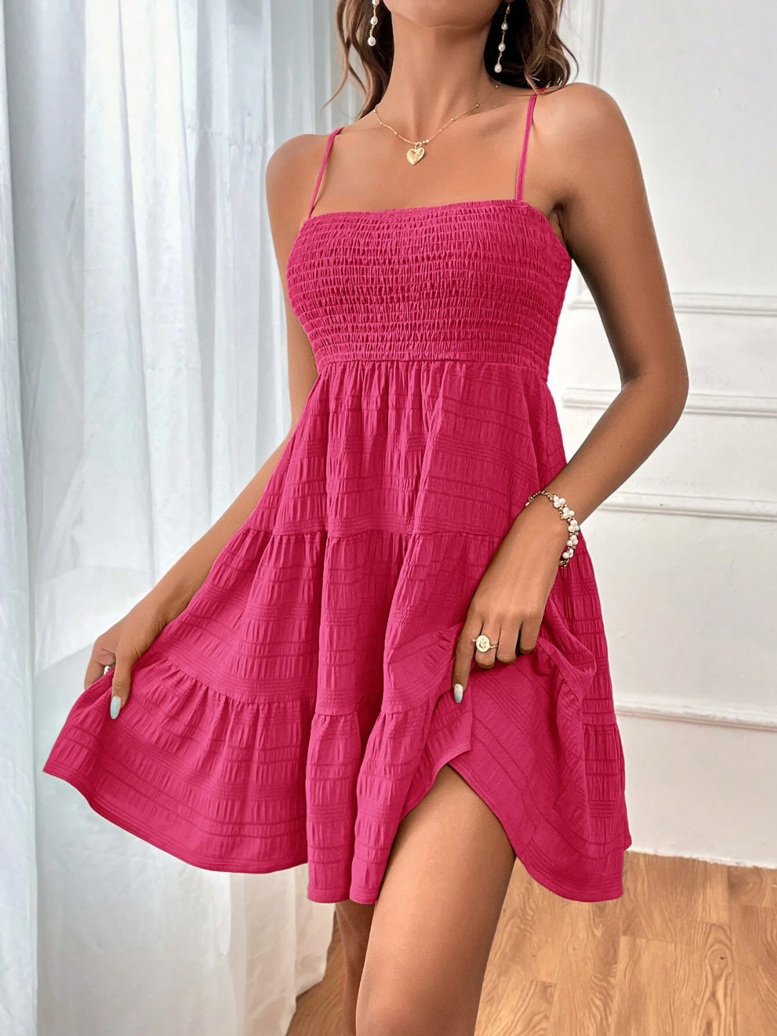 smocked tiered sleeveless mini dress