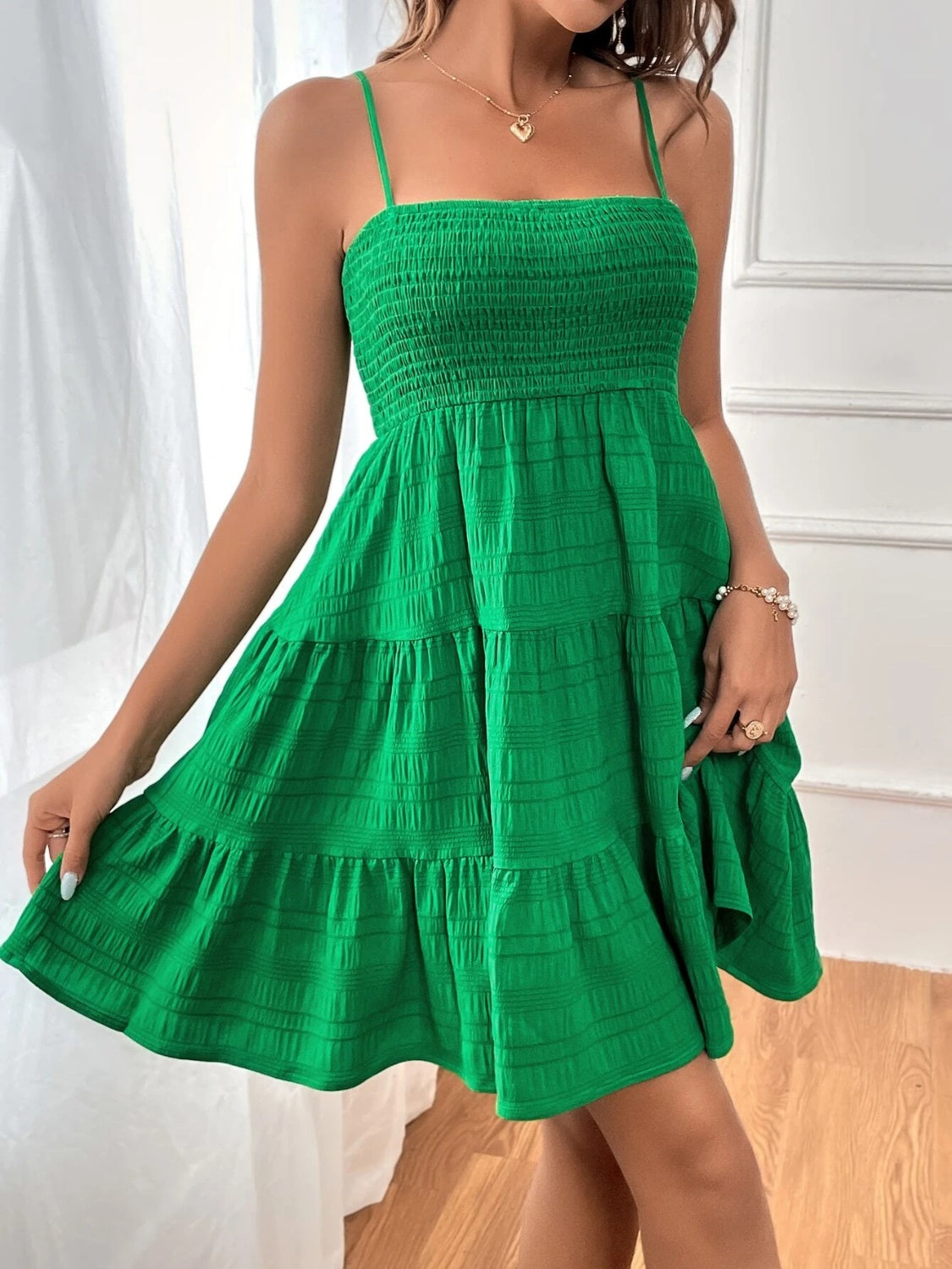 smocked tiered sleeveless mini dress