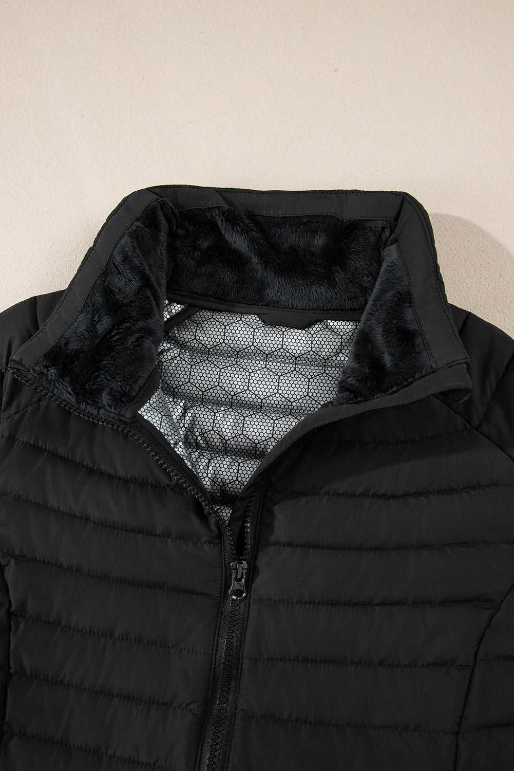 black solid color quilted zip-up puffer jacket