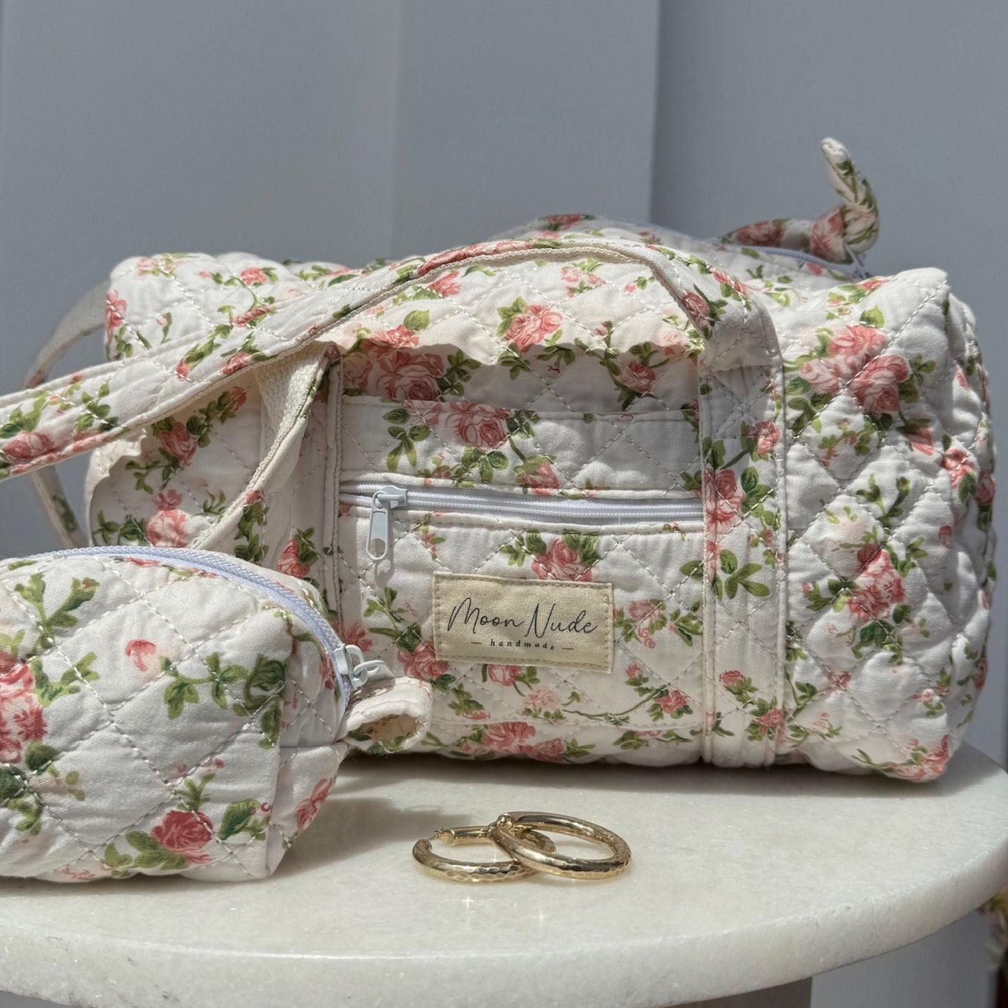 roze mini duffel bag