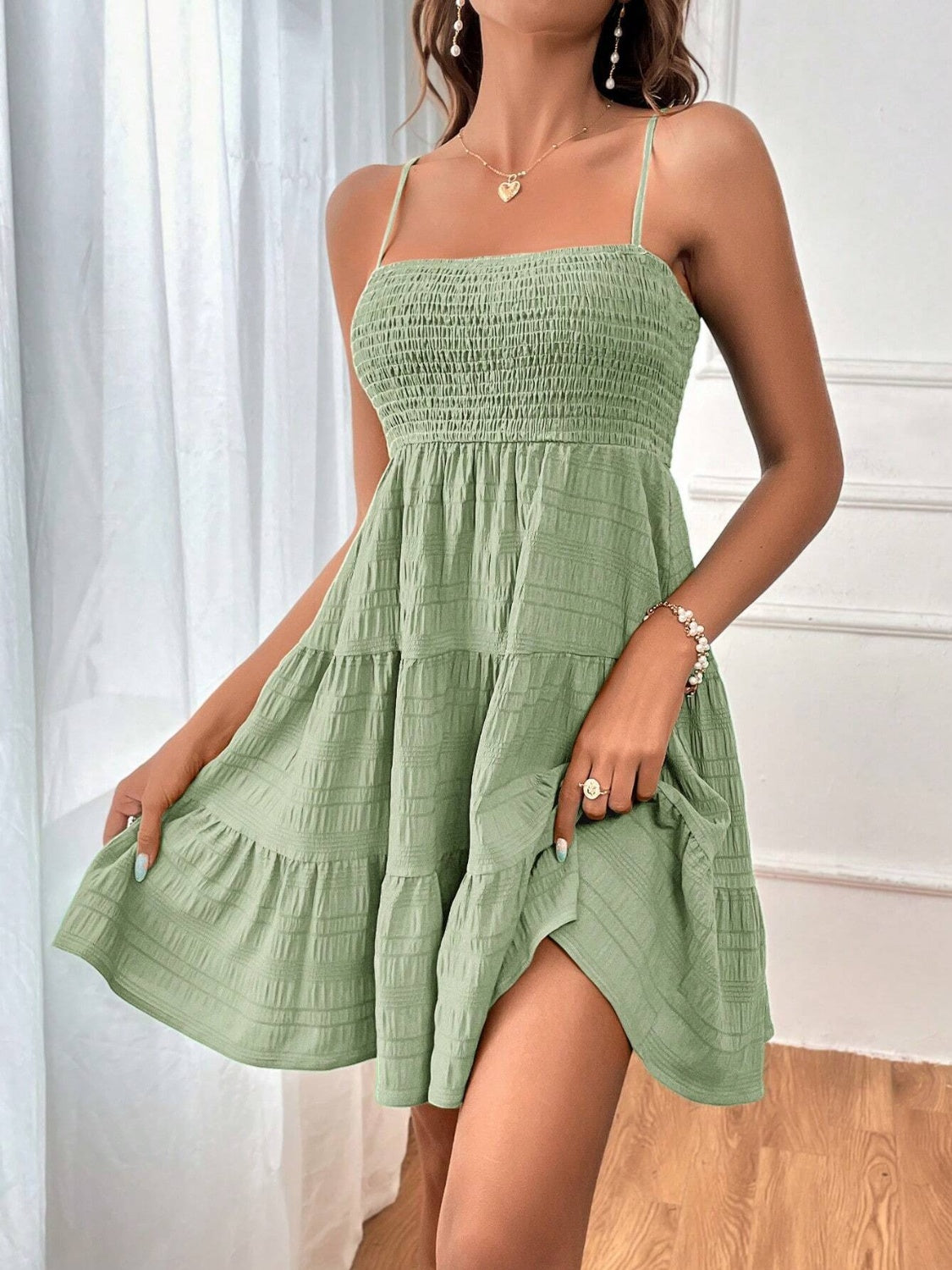 smocked tiered sleeveless mini dress