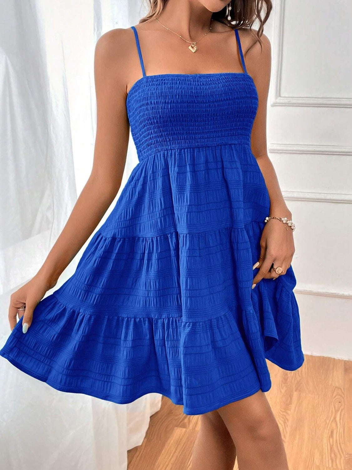 smocked tiered sleeveless mini dress