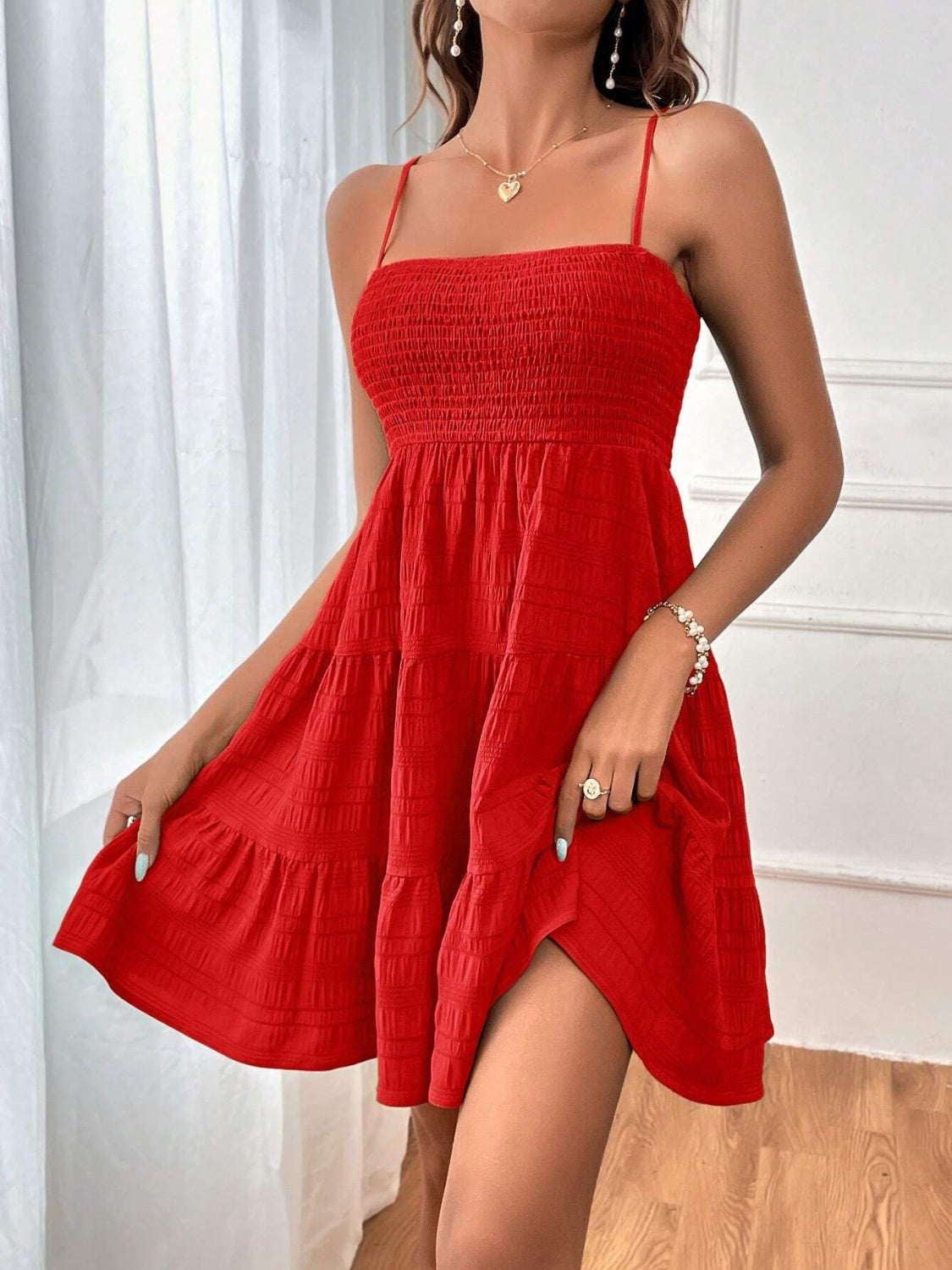 smocked tiered sleeveless mini dress