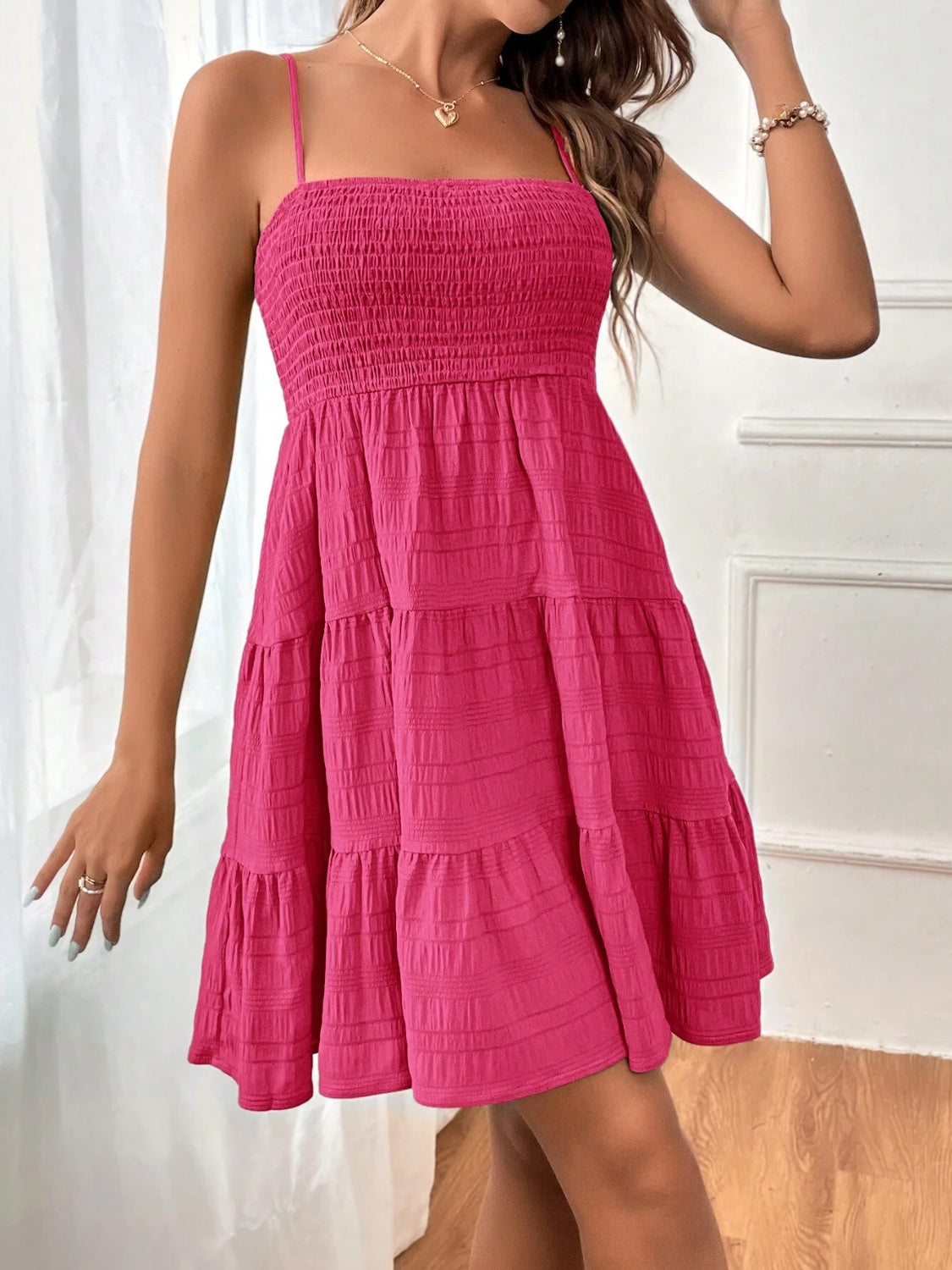 smocked tiered sleeveless mini dress