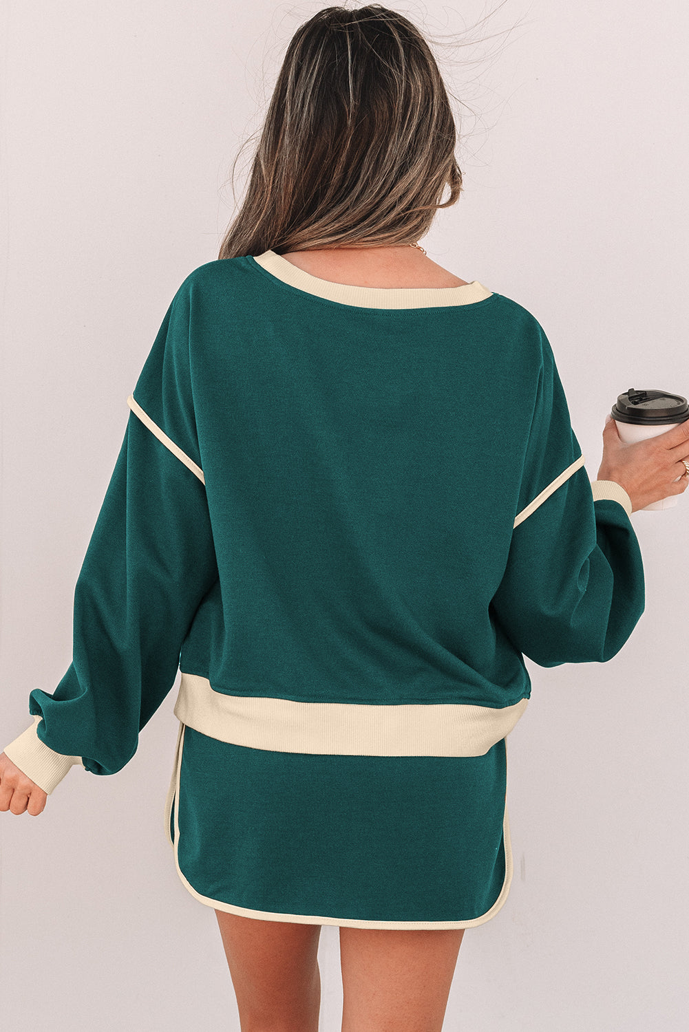 evergreen color contrast loose pullover and lace-up waist skort set
