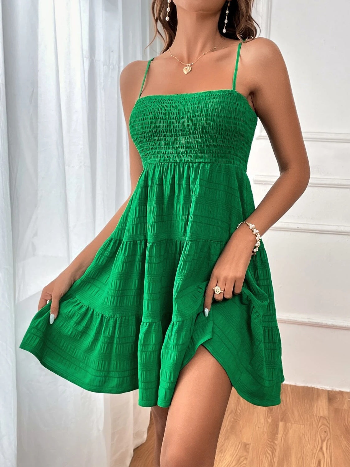 smocked tiered sleeveless mini dress