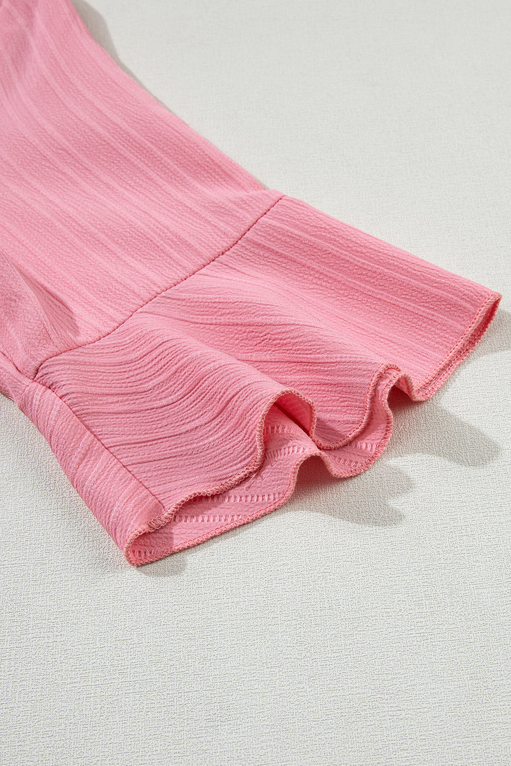 peach blossom ruffled half sleeve v neck textured top