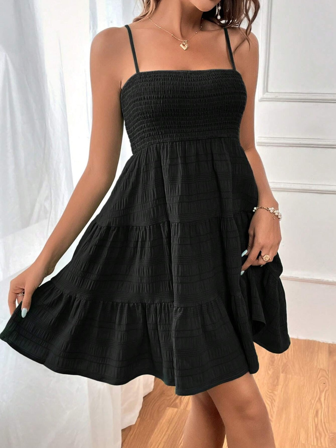 smocked tiered sleeveless mini dress