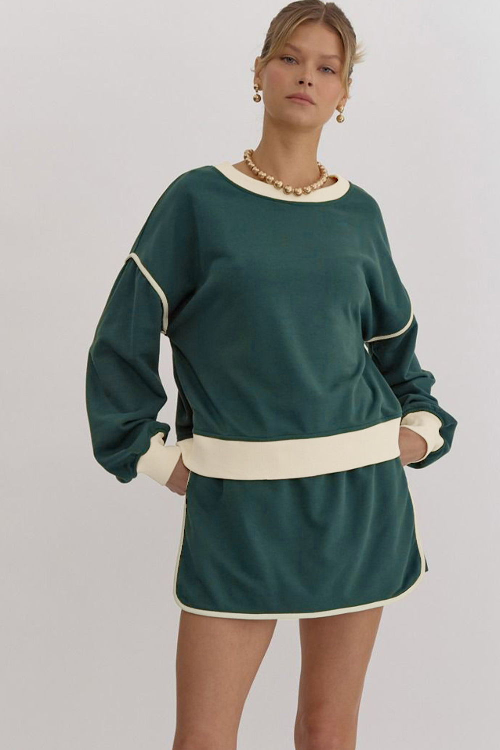 evergreen color contrast loose pullover and lace-up waist skort set