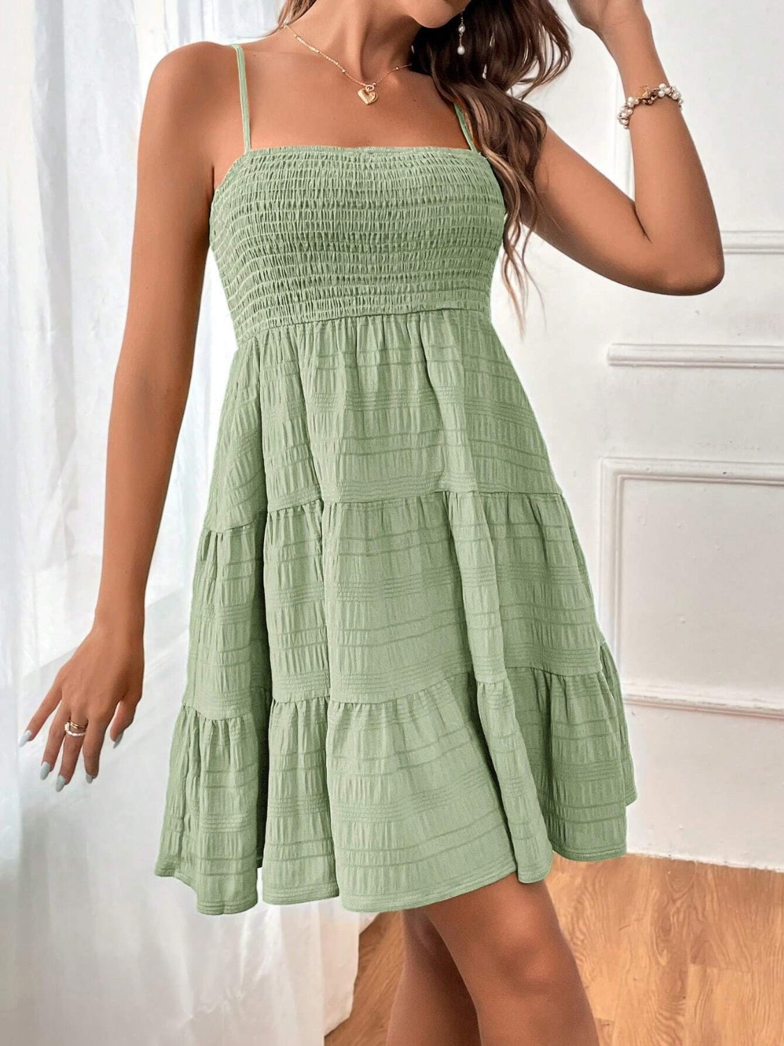 smocked tiered sleeveless mini dress