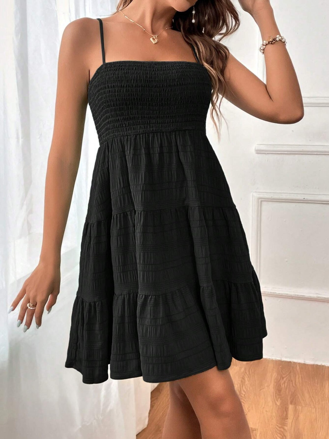smocked tiered sleeveless mini dress