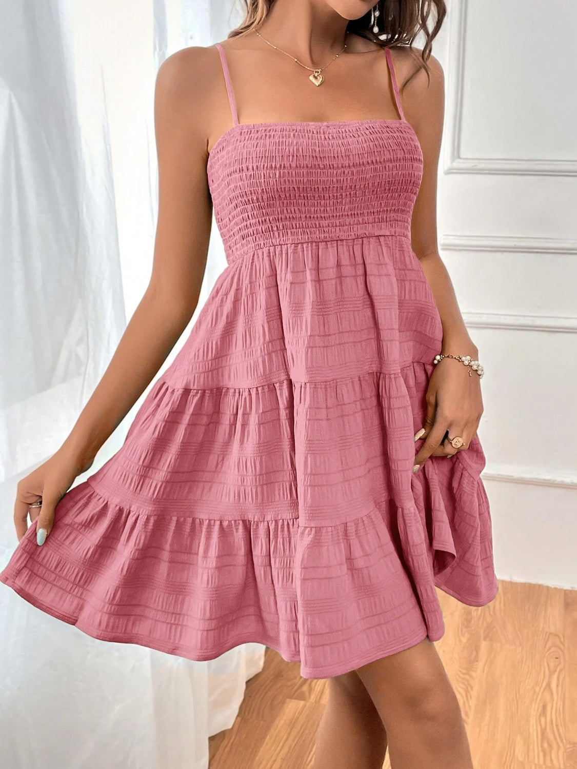 smocked tiered sleeveless mini dress