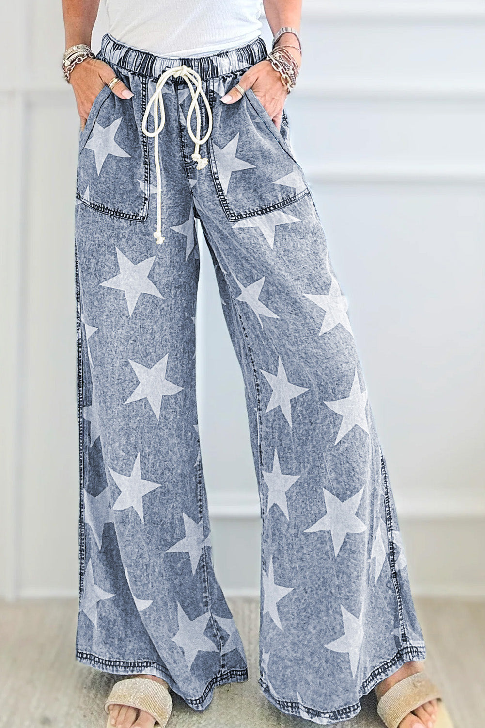 light blue star print light wash drawstring high waist wide leg jeans