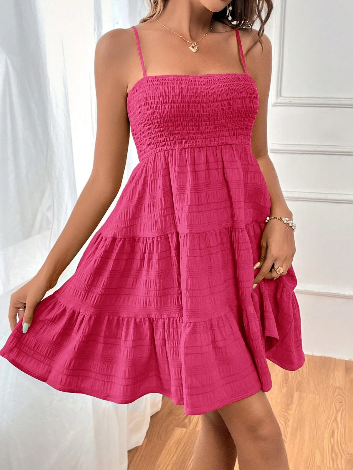 smocked tiered sleeveless mini dress