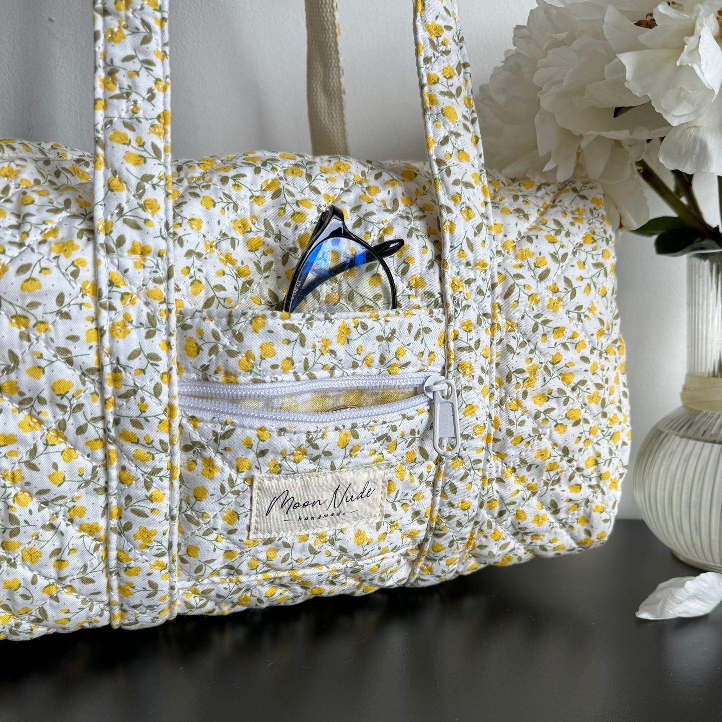 buttercup mini duffel bag