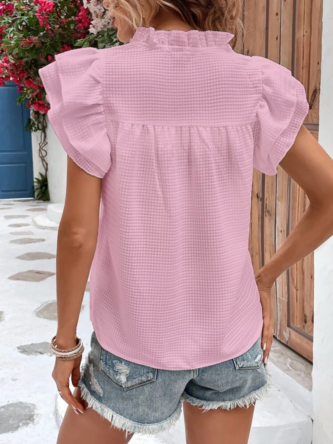 ruffled notched cap sleeve blouse